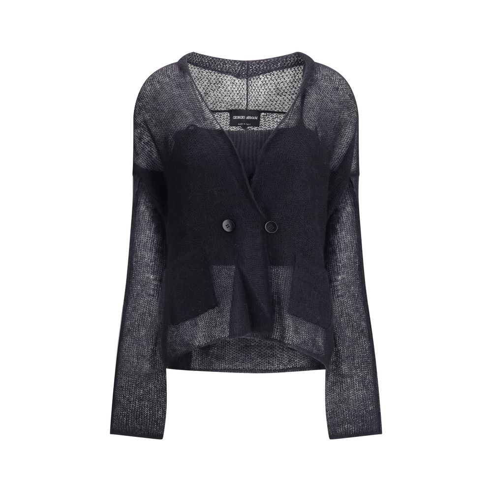 Dubbelknäppt cardigan och topp i en blandning av ull och mohair. Tvådelad kostym.