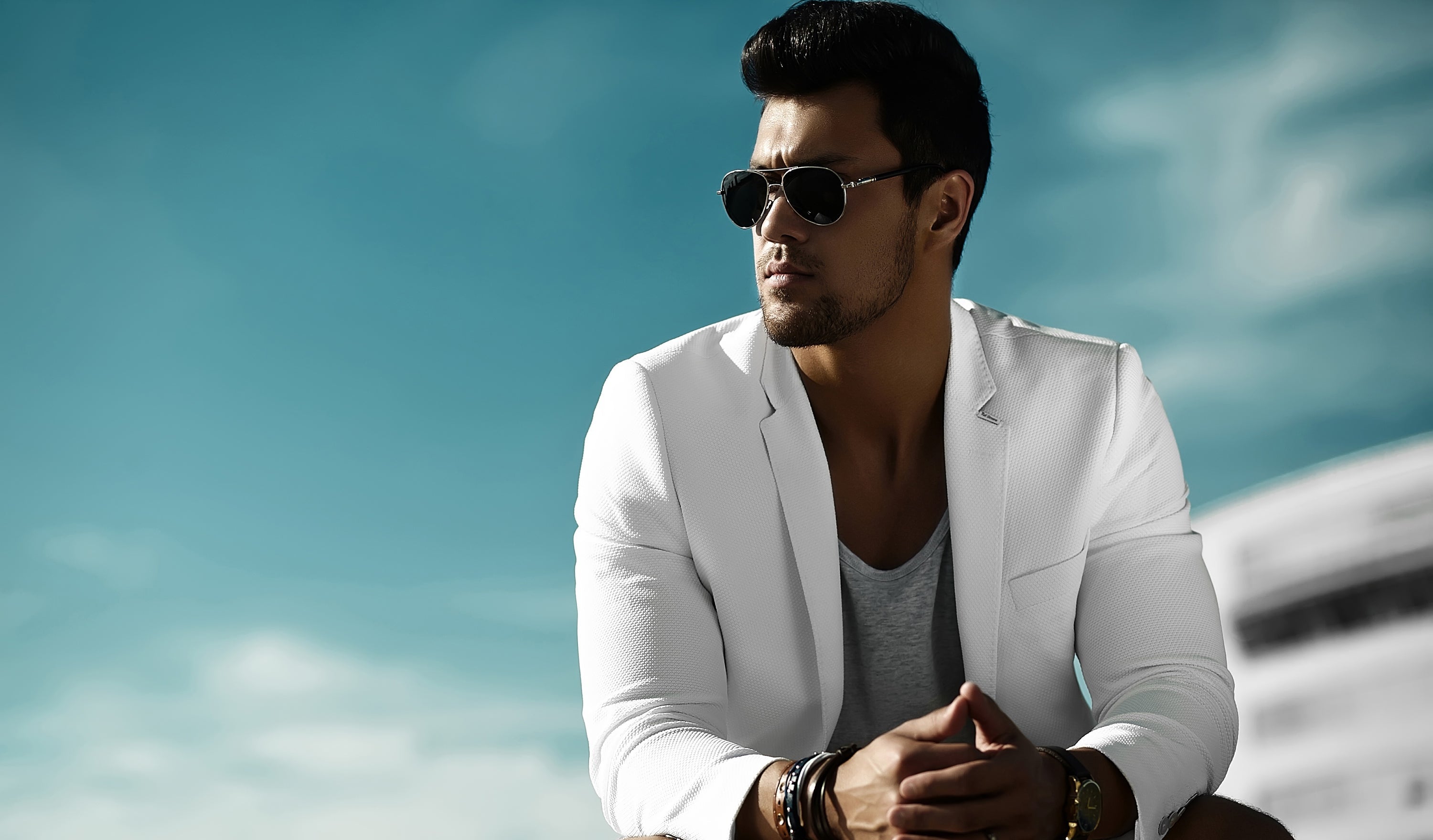 fashion-portrait-young-sexy-businessman-handsome-model-man-casual-cloth-suit-sunglasses-sitting-street-blue-sky.jpg