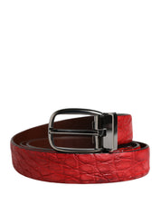 Red crocodile-patterned belt with a black buckle on a white background