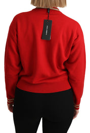 Röd stickad kashmirtröja med tecknad topp