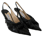 Eleganta svarta läderskor med spetsig tå