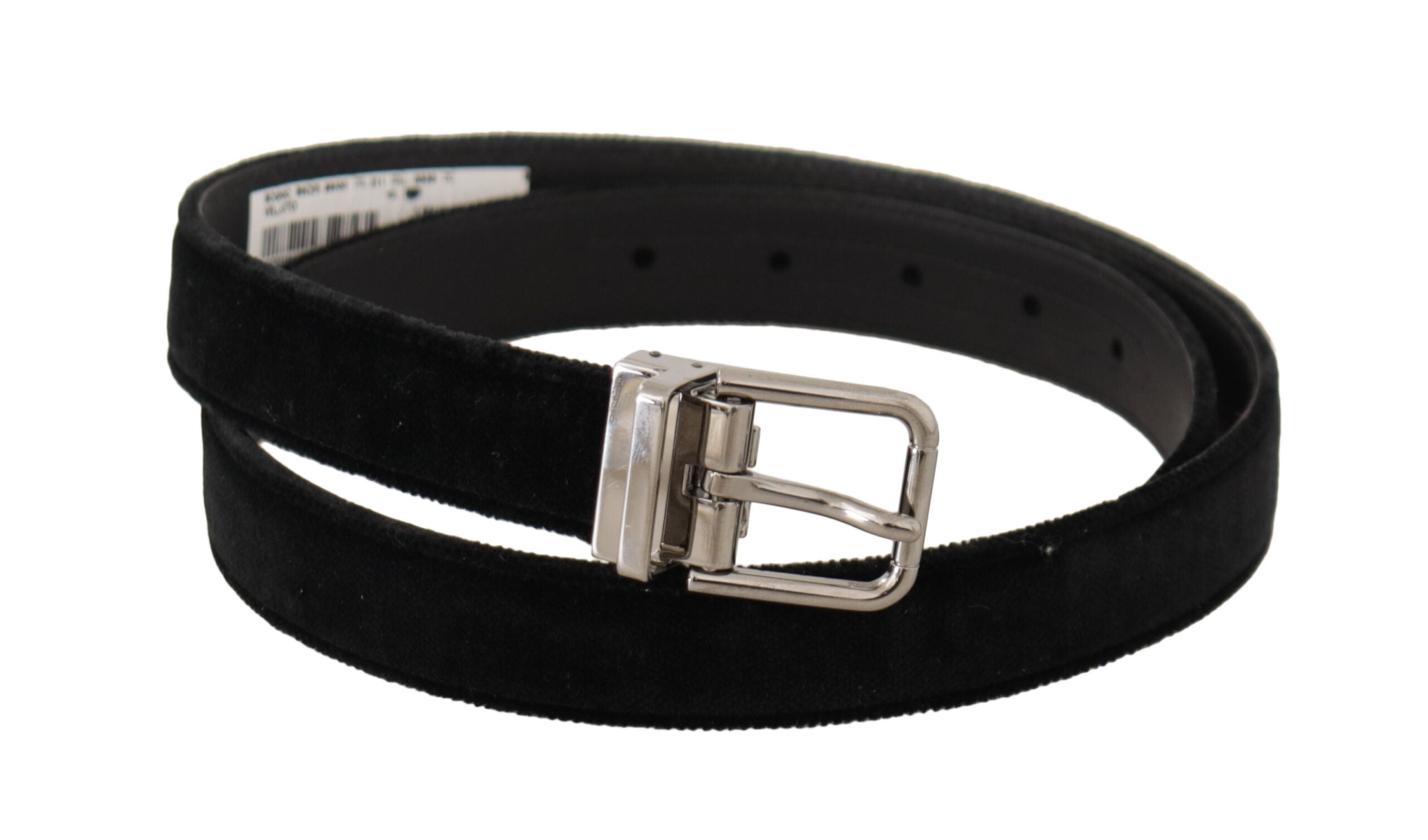Svart, vardagsmässig, sammetskänd, med silverfärgad metallösning och logoband.