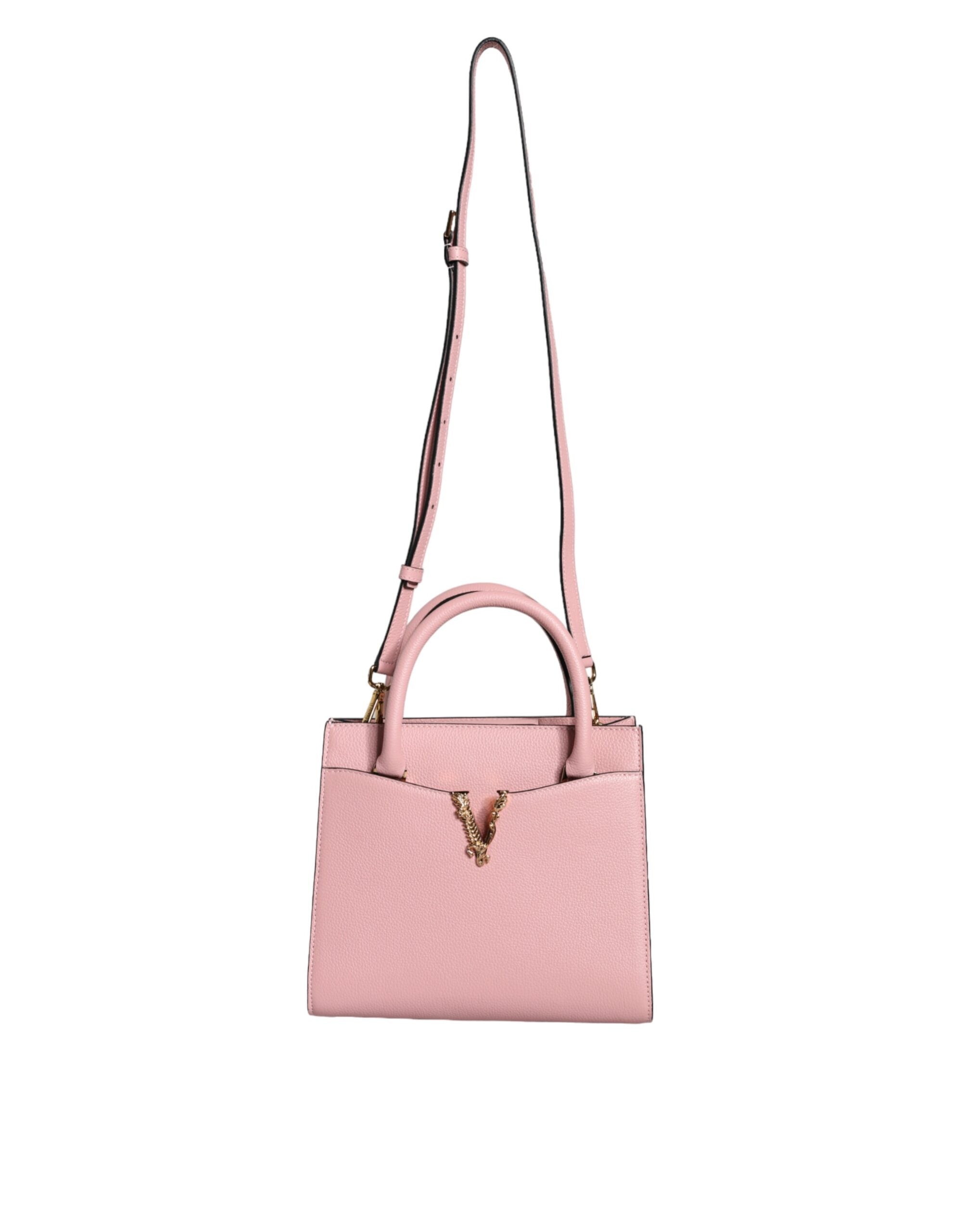Liten rosa axelväska i läder med övre handtag och strukturerat kalvskinn.