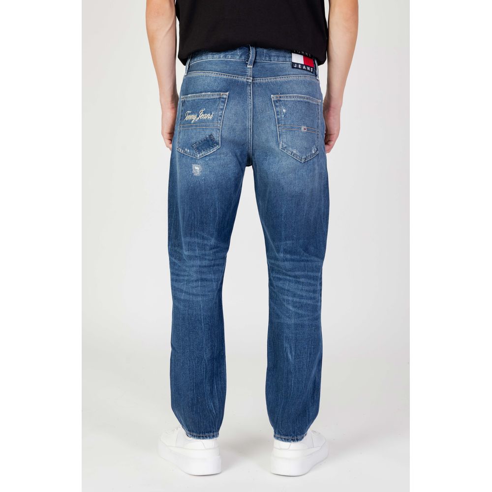 Blå slim fit jeans med avsmalnande passform och slitna detaljer