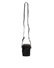 Crossbody-kameratask i svart läder med logotyp