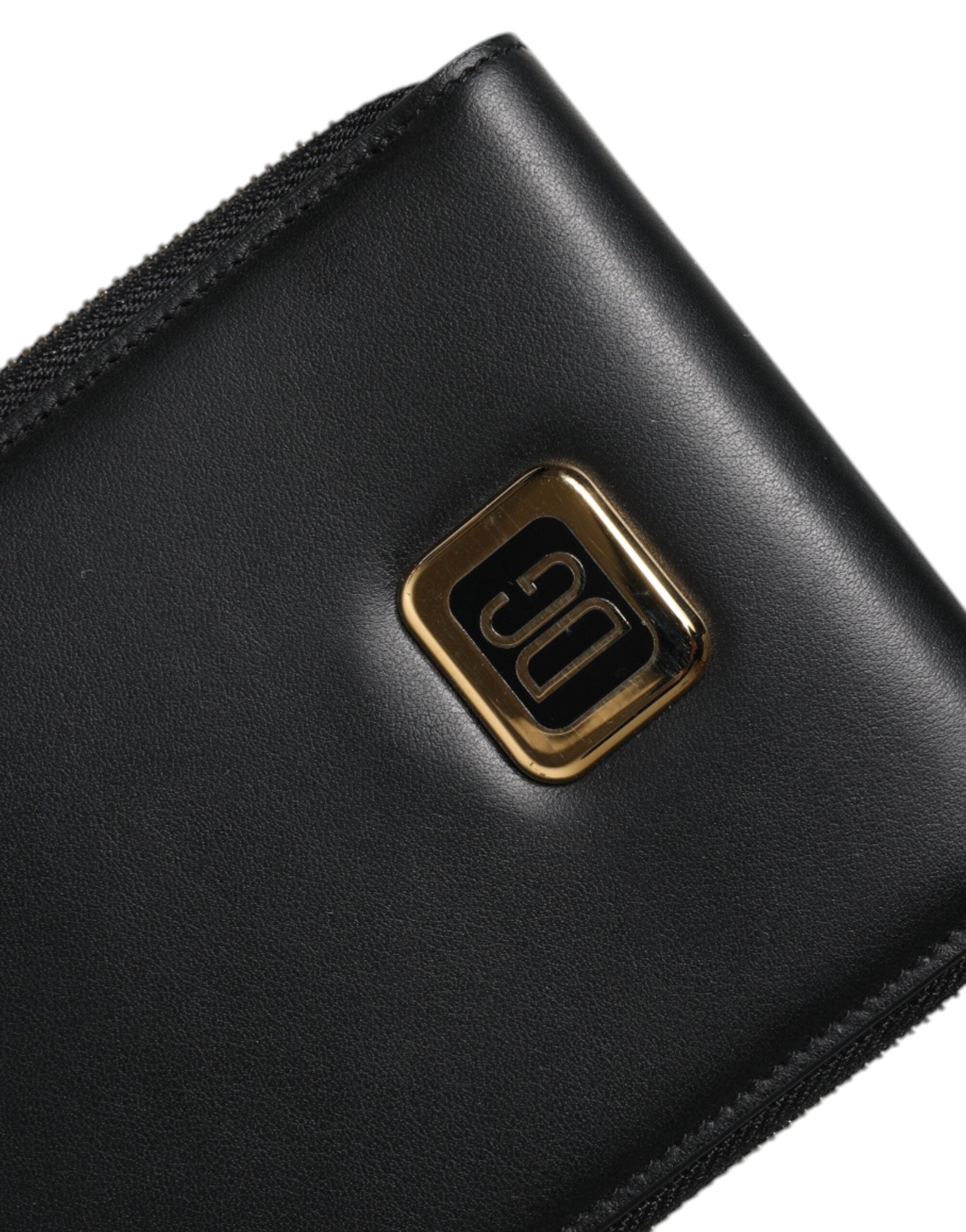 Dolce & Gabbana Plånbok i svart läder med logotypplatta för kort och mynt