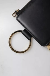 Dolce & Gabbana Plånbok i svart läder med logotypplatta för kort och mynt