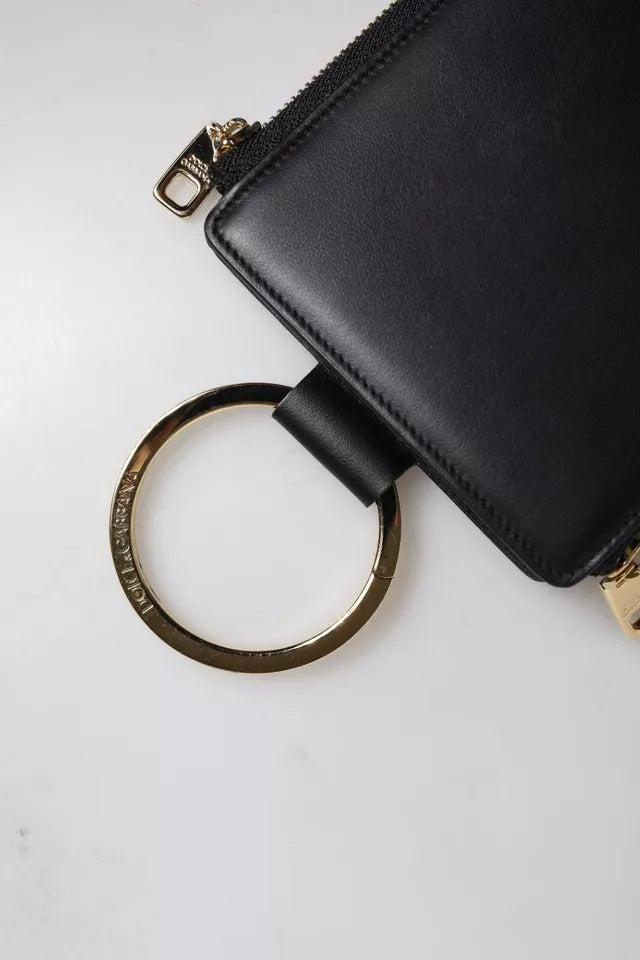 Dolce & Gabbana Plånbok i svart läder med logotypplatta för kort och mynt