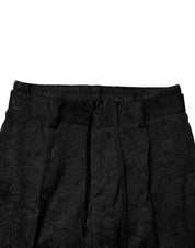 Svarta brokadpolyester smala klänningsbyxor