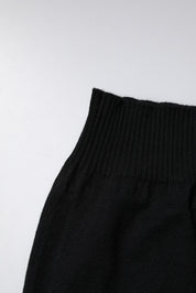 Svart kashmirhalsduk med logotypdetaljer