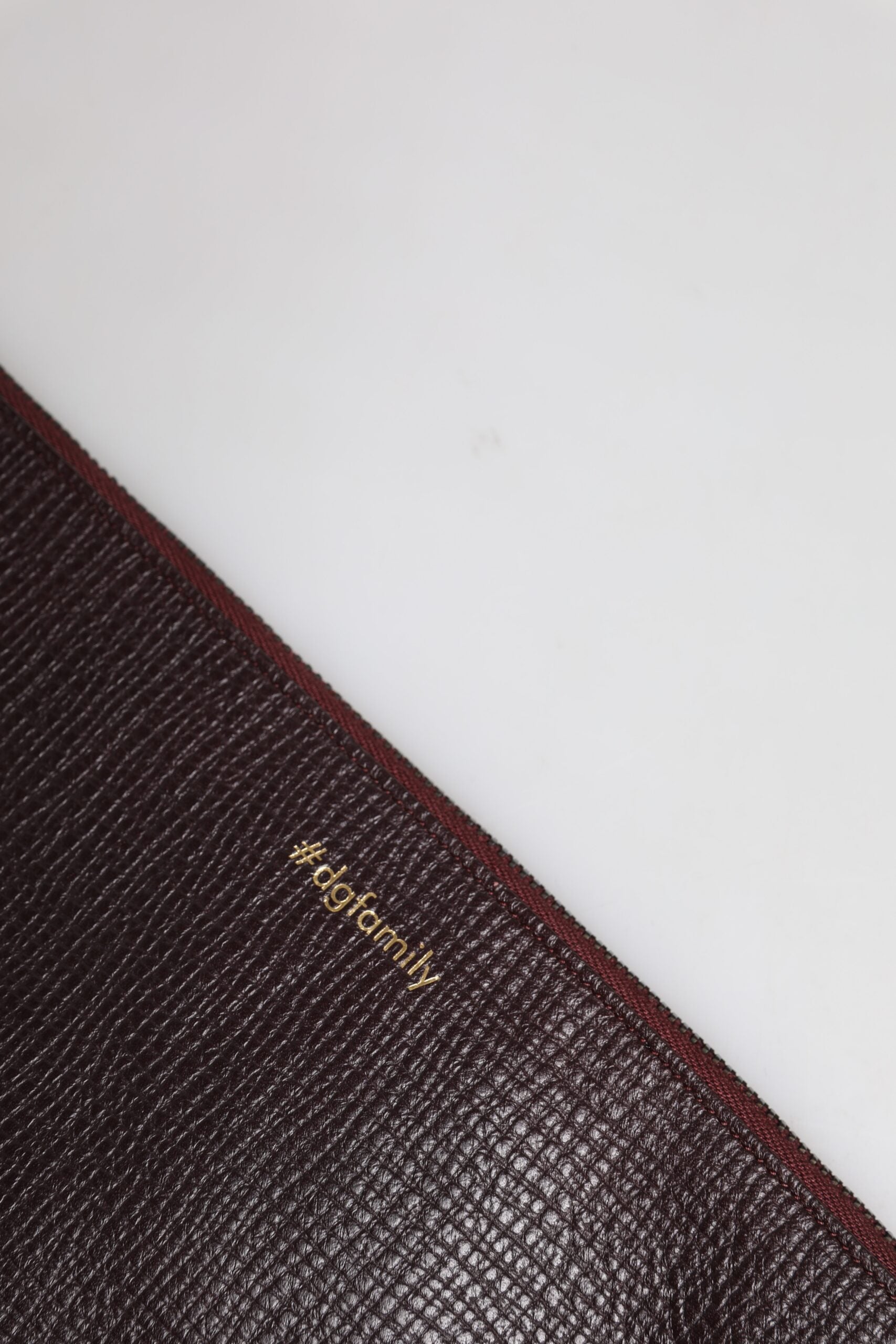 Brun läderclutch/väska för män med #DGFAMILY-detaljer