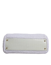 Vit läderhandväska med raffia-detaljer och topphandtag