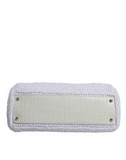 Vit läderhandväska med raffia-detaljer och topphandtag