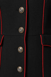 Svarta och vita pumps i läder och tyg med hög klack och CC-logotyp