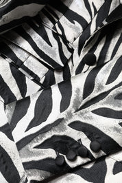 Svart quiltad Chanel-axelväska i lammskinn med CC-logotyp