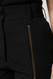 Svarta läder- och mockastövlar med spetsiga tår