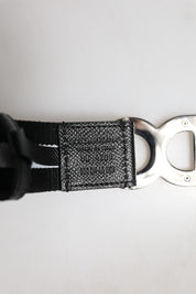 Svart bomullsgürtel med metallisk DG-logotyp och guldspänne