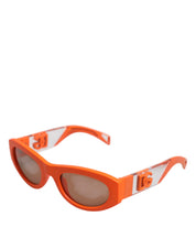 Orange Reborn To Live solglasögon med ovala glas och logo.