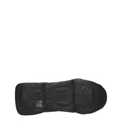 Svarta grova tygsneakers med logotyp