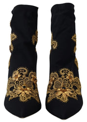 Stövlar med svarta och guldfärgade broderier och kristaller – Dolce & Gabbana