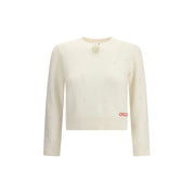 Jumper with a buttoned keyhole neck