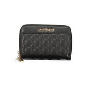 Black quilted wallet with gold zipper pull on a white background