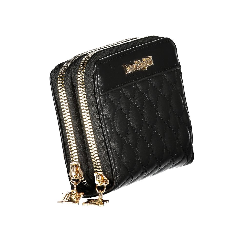 Black quilted handbag with gold zippers on a white background