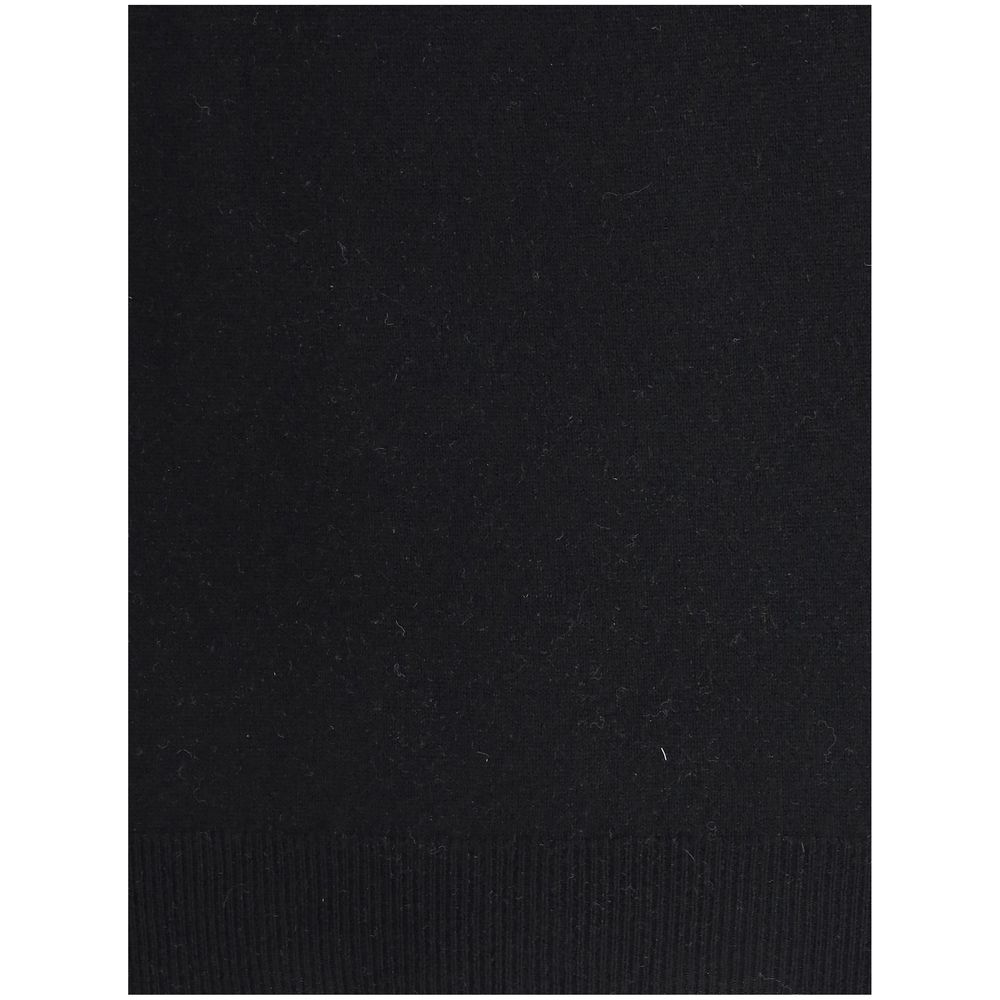 Svarta tröjor i merinoull med höggolv