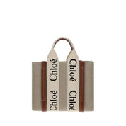 Brun canvasväska med monogram