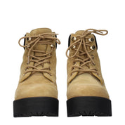 Bruna mockastövlar med logotypdetaljer